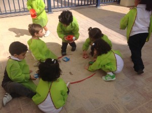 Rainbow class enjoying some sand play in the playground!